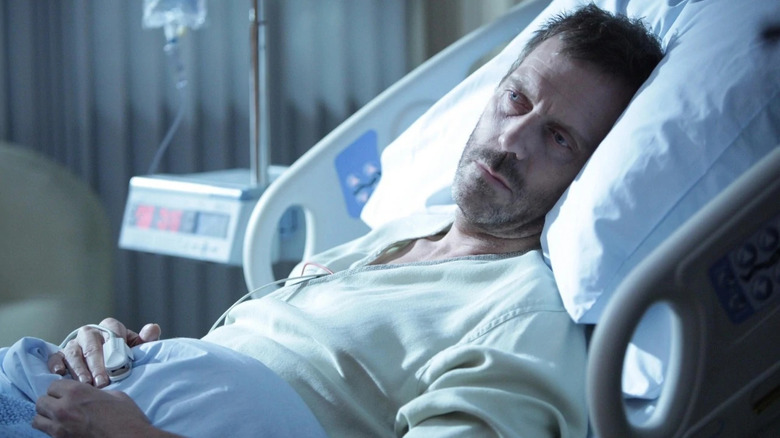 House lies in a hospital bed