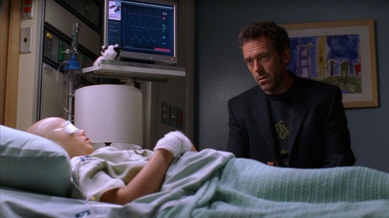 House attends to a child patient