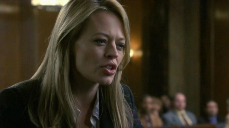 Jeri Ryan speaks to a witness