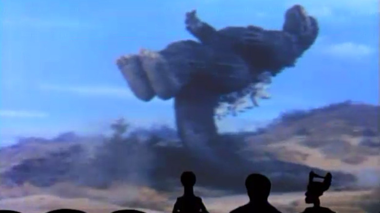 Godzilla flying in the air