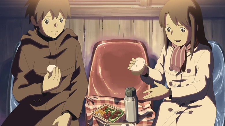 Takaki and Kanae eating in station