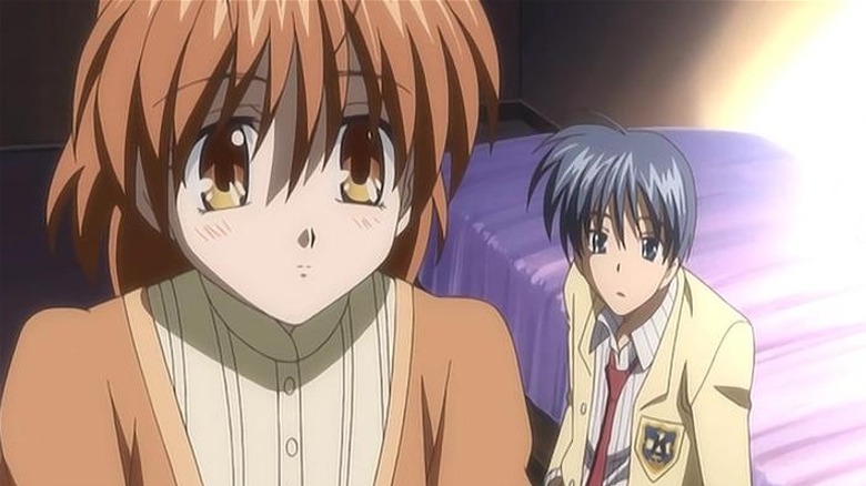 Nagisa and Tomoya looking solemn 