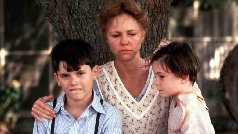 Sally Field sits under tree