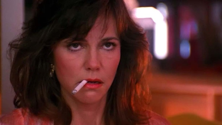 Sally Field smokes a cigarette