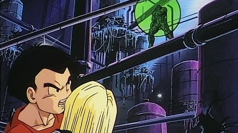 Krillin holds Android 18 as Broly attacks