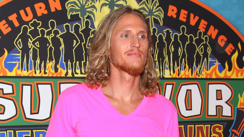 Tyson Apostol wearing pink shirt