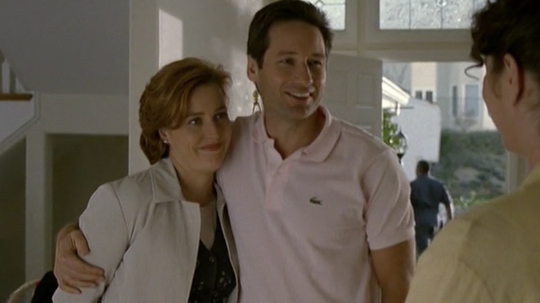 Gillian Anderson and David Duchovny hugging