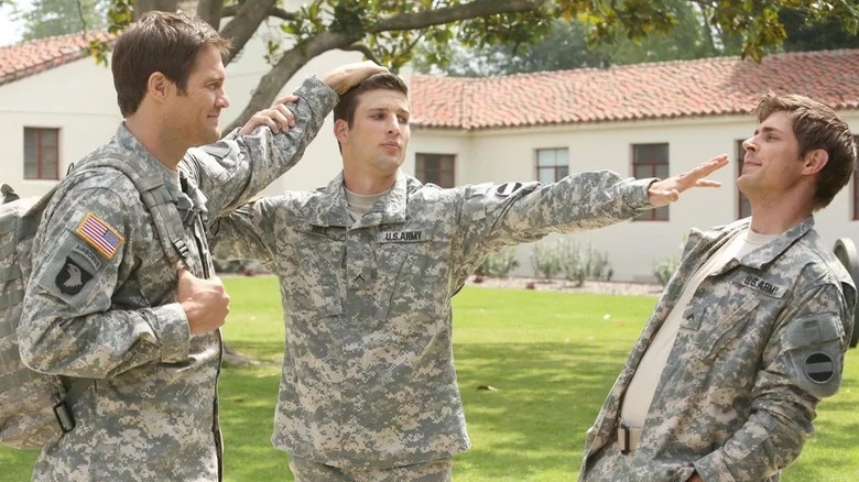 Pete and Randy try to get brother Derek Hill to join a group hug