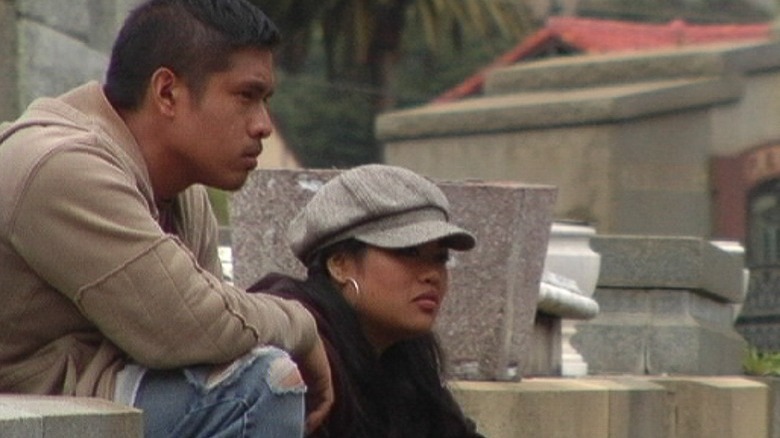 Rodel and Maribel sitting in graveyard