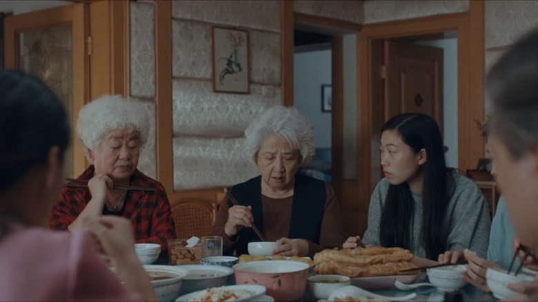 Nai Nai and her family eating at table