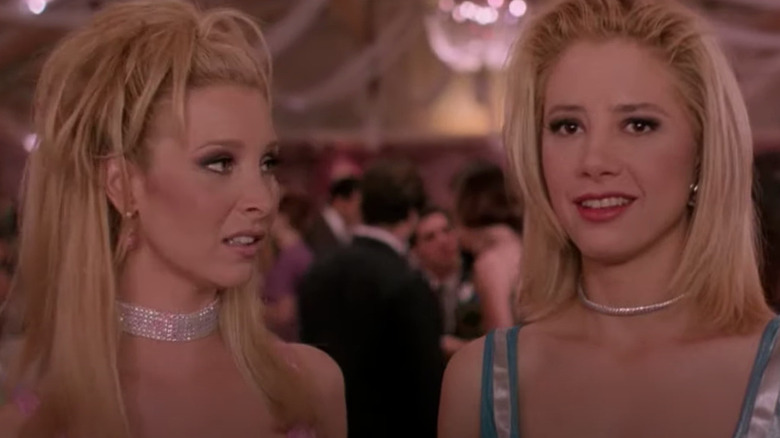 Romy and Michele in brightly colored dresses