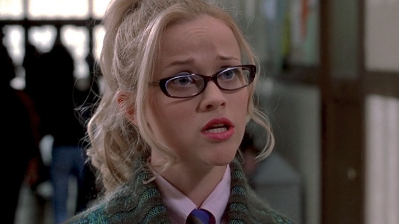 Reese Witherspoon stands in Legally Blonde