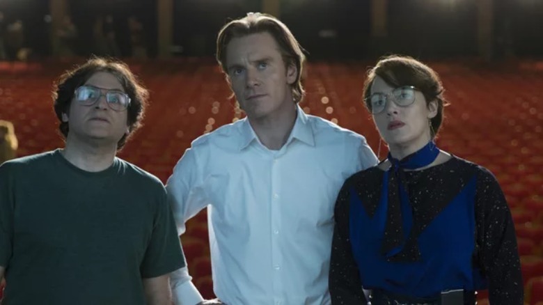 Hertzfeld, Jobs and Hoffman look at screen