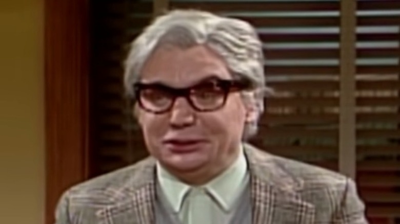 Mike Myers grey hair glasses