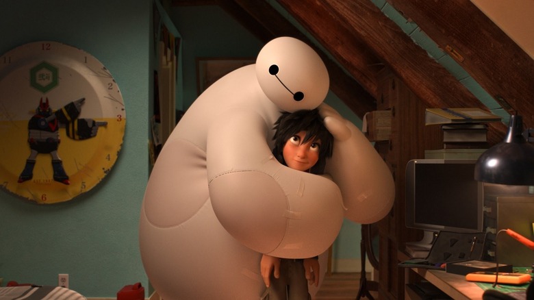 Baymax giving Hiro a hug