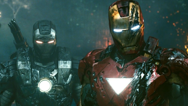 War Machine and Iron Man in the dark