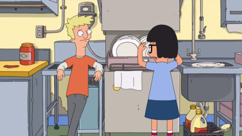 Logan and Tina washing dishes