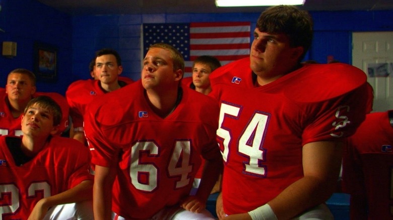 Football players looking up