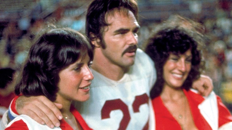 Burt Reynolds in a football jersey