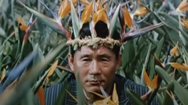 Takeshi Kitano with flower crown