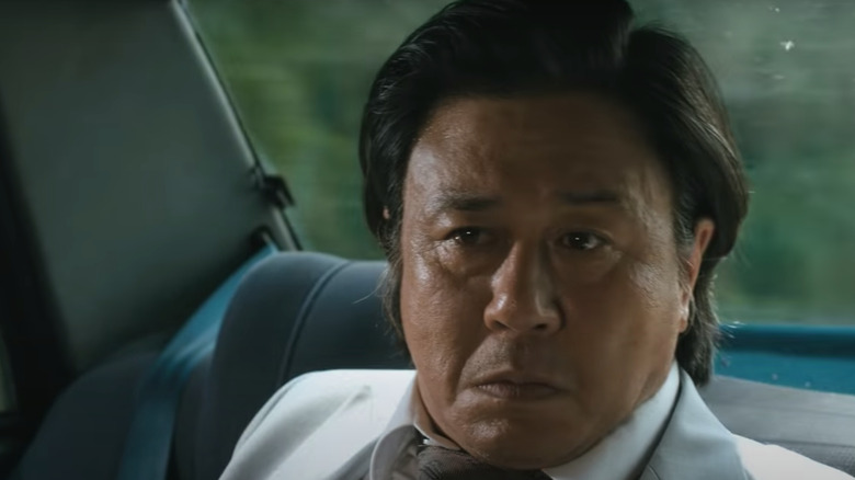 Choi Min-sik in white suit