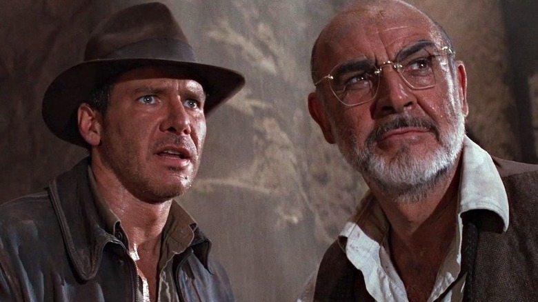 Harrison Ford and Sean Connery observing something