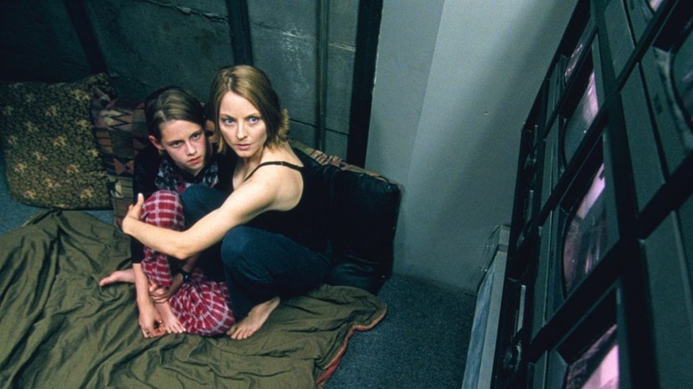 Foster and Stewart huddled in panic room