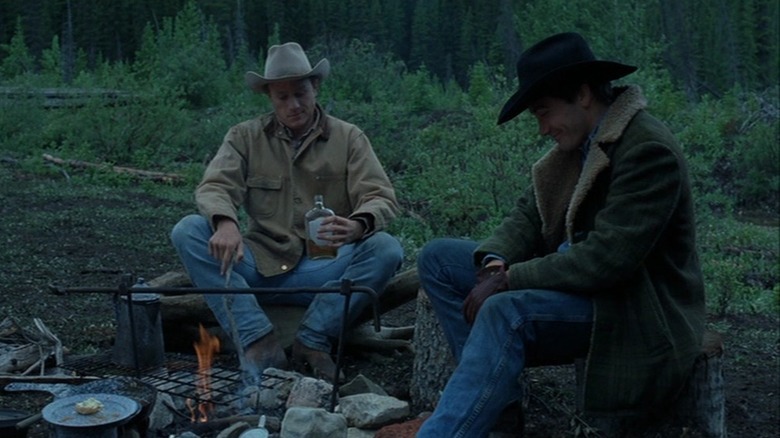 Ennis Del Mar and Jack Twist around campfire