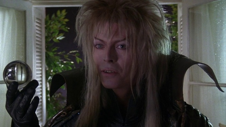 Jareth holds up orb