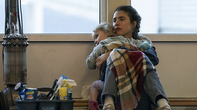 Alex holding Maddy in ferry station