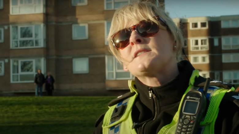 Sergeant Catherine Cawood wearing sunglasses