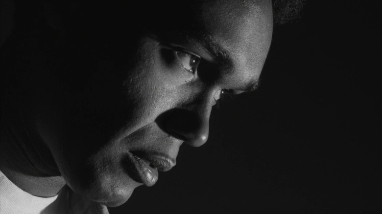 Duane Jones as Ben, staring