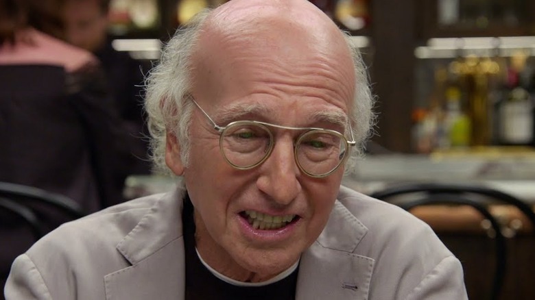 Larry David gritting teeth