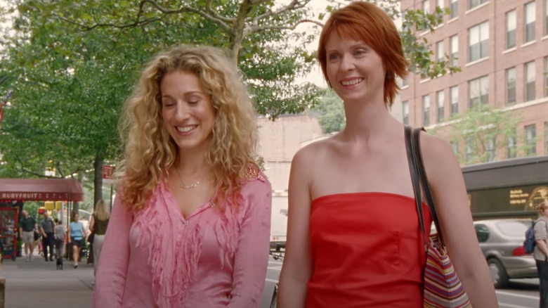 Carrie and Miranda smiling on street