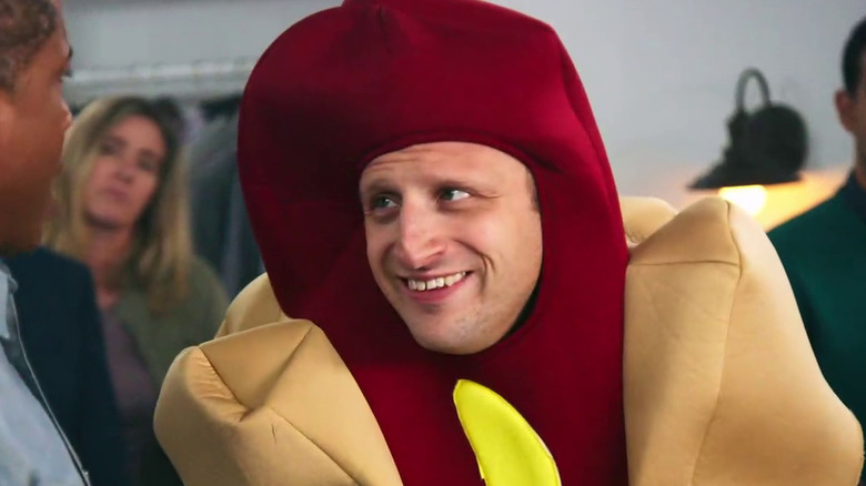 Tim Robinson wearing hot dog suit