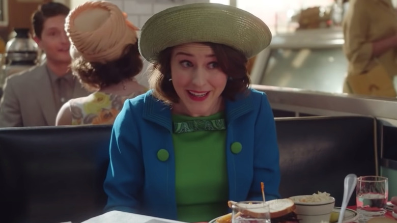 Mrs. Maisel in deli booth