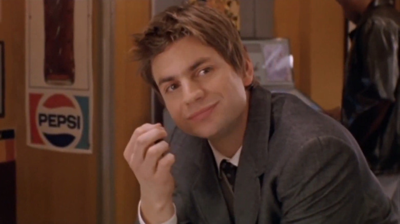 Brian Kinney smiling