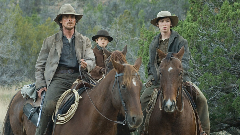 Dan and his two sons on horseback