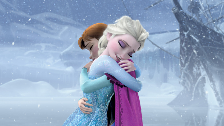 Anna and Elsa hug in Frozen