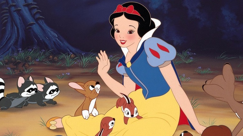 Snow White talks to forest creatures