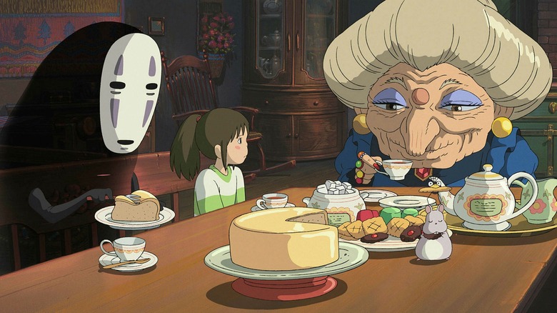 Chihiro and No Face eat in Spirited Away 