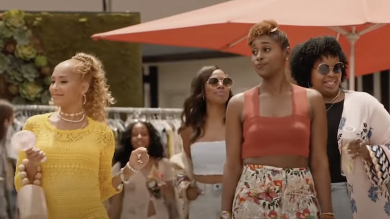 The Insecure women walk through pool party