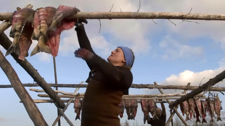 Alaskans drying salmon