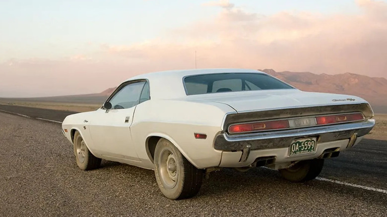 White Challenger sitting roadside