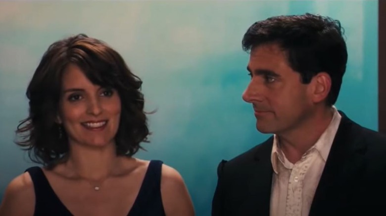 Tina Fey smiling, Steve Carrell disheveled 