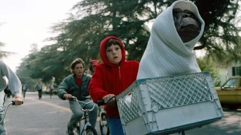 Henry Thomas rides bike with E.T. in basket