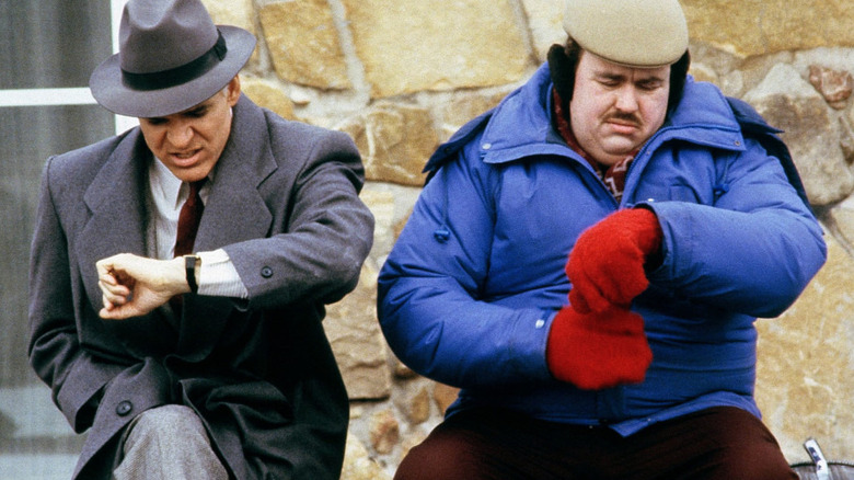 Steve Martin and John Candy look at watches