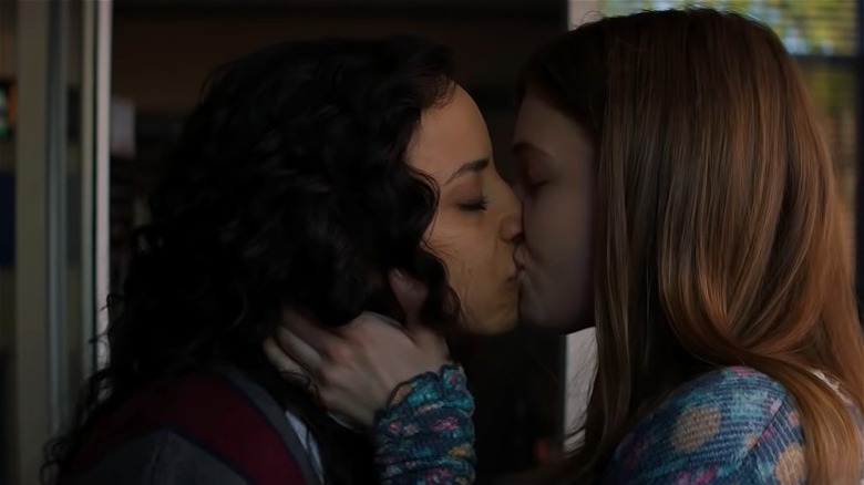 Deena and Sam kissing