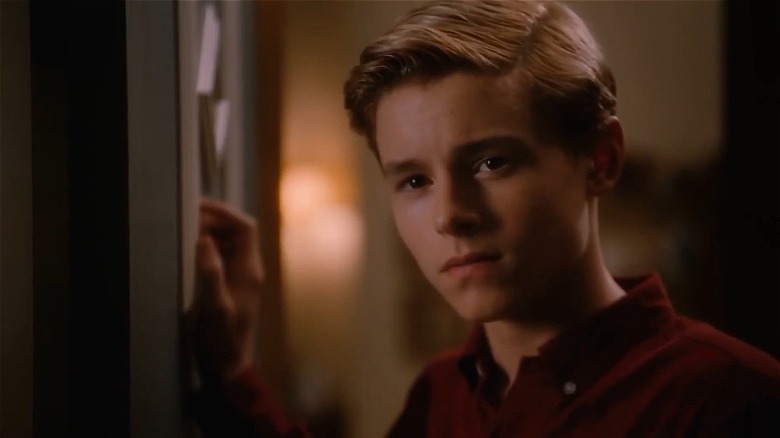 Callan McAuliffe wearing a red shirt