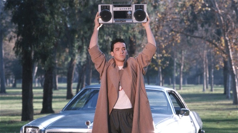 John Cusack holding a boombox